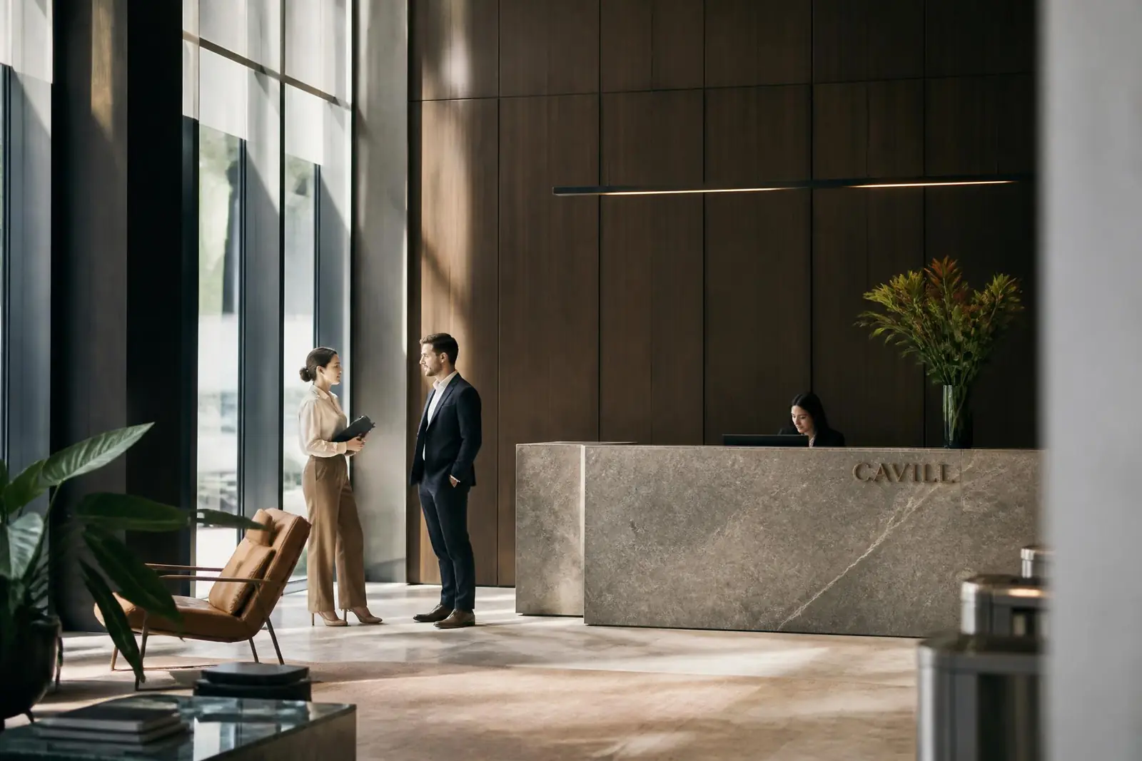 Office scenting in an architectural reception filled with natural light